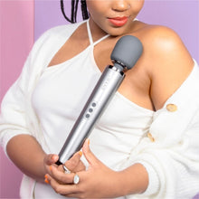 Load image into Gallery viewer, Wand vibrator, girl holding grey wand massage vibrator, best wand massager, magic rechargeable wand vibrators, vibration therapy tool, what is the best wand vibrator, powerful vibrator, magic wand vibrators buyers guide, is the wand massager a vibrator?, rechargeable magic wand vibrator review, best vibrator, le wand vibes, best vibrators, how to use a vibrator, bdsm wand, massage wand tool
