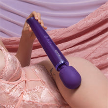 Load image into Gallery viewer, Wand vibrator, girl holding purple le wand massage vibrator, best wand massager, magic rechargeable wand vibrators, vibration therapy tool, what is the best wand vibrator, powerful vibrator, magic wand vibrators buyers guide, is the wand massager a vibrator?, rechargeable magic wand vibrator review, best vibrator, le wand vibes, best vibrators, how to use a vibrator, bdsm wand, massage wand tool