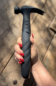 black hammer vibrator in woman's hand vibrator sweet Love Hamma sex toy Vibrator